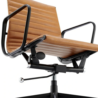 Eames executive office chair   EA117 black Frame tan leather close up